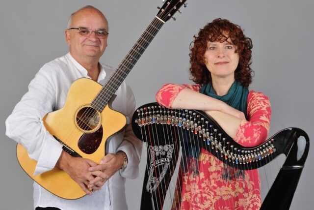 Photo of Maire Ni Chathasaigh w/her harp and Chris Newman w/his guitar.